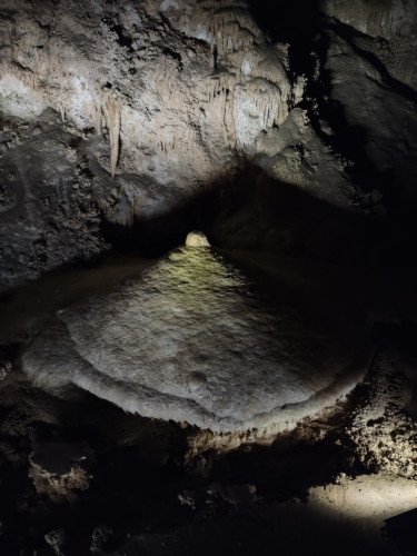 A cave stalagmite that resembles a human breast.