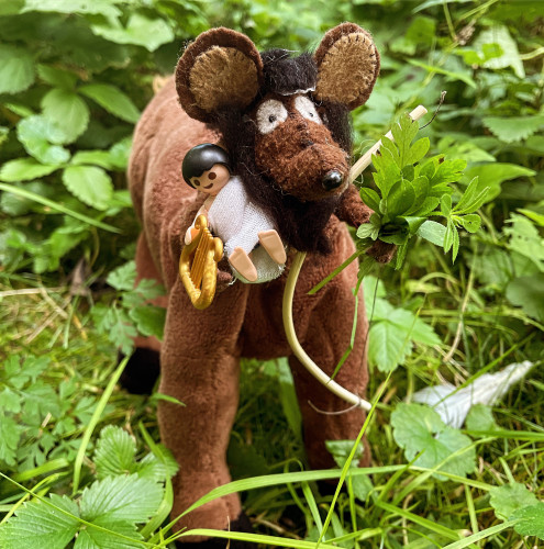Photo of Minimus the Latin mouse as Chiron the centaur, with a mouse top half and an oversized horse lower half. He's holding a Playmobil child, a bow, a lyre and a sprig of herbs.
