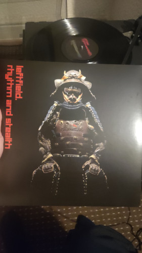 A vinyl cover with a samari warrior in full gear on the front 