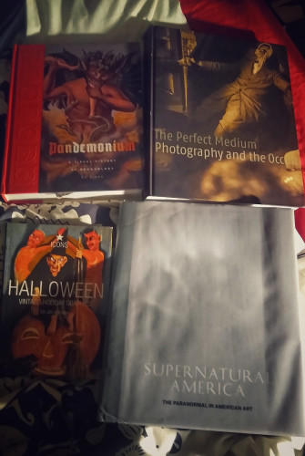 4 book covers - 
Pandemonium: A virtual history of demonology.
The Perfect Medium: photography and the occult. 
Halloween: Vintage Graphics.
Supernatural America: The Paranormal in American Art