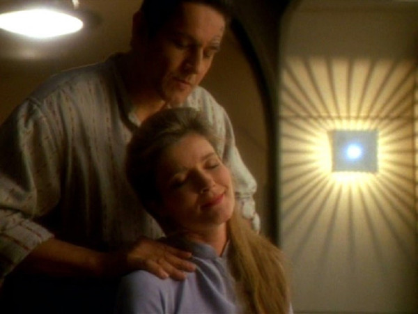 Chakotay giving Janeway a massage