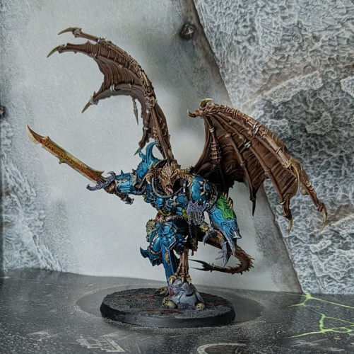 Warhammer 40k Chaos Space Marine Daemon Prince with wings and a sword. Painted green/blue in an Alpha Legion scheme. Contrast Paint over metallics is love.