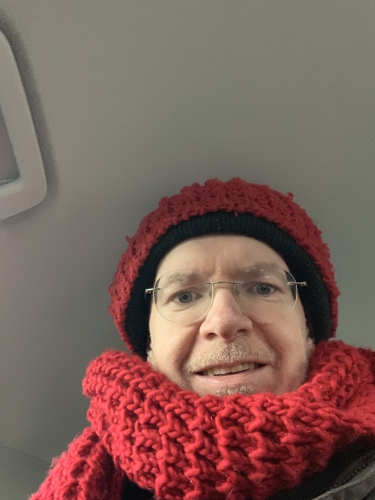 Photo of me in a red scarf and hat