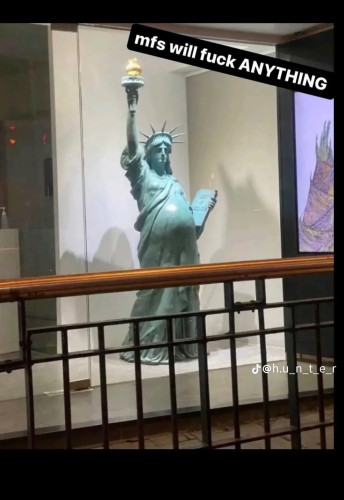 A picture of a small statue of the Statue of Liberty with a pregnant belly. A caption is added in the top right that says “mfs will fuck ANYTHING”