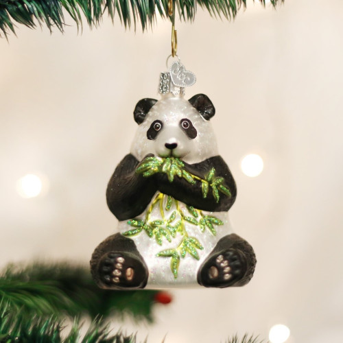 Christmas tree ball shaped like a sitting Giant Panda which eats bamboo.