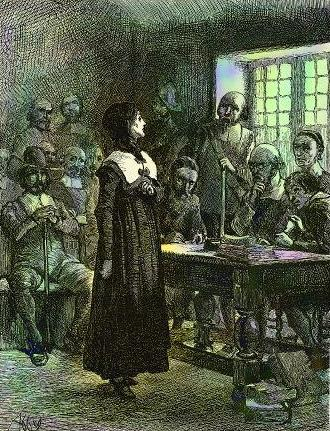 An illustration imagining Anne Hutchinson's trial. She stands, a lone woman, in the middle of the picture, staring at the men who have gathered around to hear what she has to say. From Edwin Austin Abbey in 1901