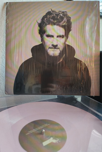 Matt Nathanson - Boston Accent album cover. A picture of Matt in a hoodie on a grey background.