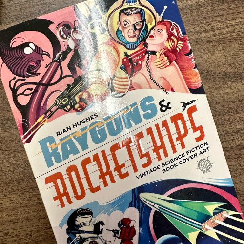 Cover of Rayguns and Rocketships, a hardcover book. Top left a man in a spacesuit fights an alien insectoid monster; top right a villain in a spacesuit holds a chained woman; bottom left a man in a spacesuit faces off against a robot; bottom right a green rocket blasts through space.
