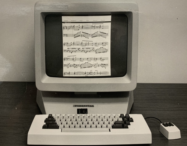 Square black and white image of an early 1980s PC with three button mouse and keyboard, desktop/monitor. On the dark bordered screen is a sheet of music with the musical score of Mockingbird, and early  use of computers for music composition by famed computer scientist Severo M. Ornstein.