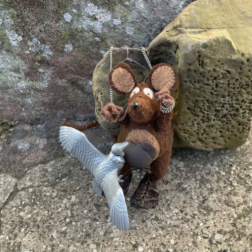 Photo of Minimus the Latin mouse as Prometheus being attacked by a vulture. Minimus is chained to a rock, and a small playmobil vulture is pecking at the model liver attached to his tummy.