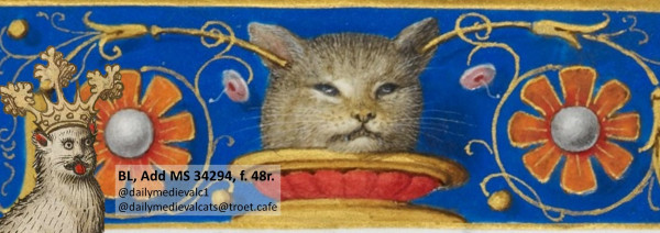 Picture from a medieval manuscript: A cat’s head on a plate