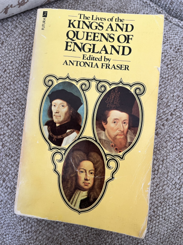 Cover of the book featuring portraits of Kings on a yellow background.
