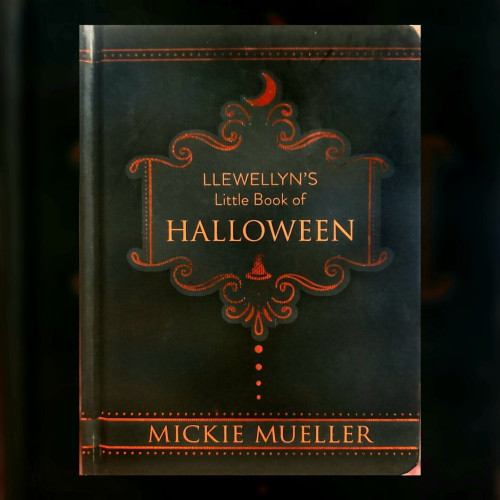 A photo of "Llewellyn's Little Book of Halloween" by Mickie Mueller.

This smallish black book is lightly embossed and highlighted in chromed colors: red for flourishes and orange for text. The cover has been pressed smooth where text appears. In the center is the orange title, surrounded by a fancy red Victorian-style border with a left-side open crescent moon at the top and a crimped pointy witch hat inside the bottom. Across the top and bottom of the book are borders that wrap around the spine to the back cover. The narrow red top border is two thin straight lines sandwiching a row of dots. The wide red bottom border holds the author's name in orange. Two thin lines contain the name, one across the top, one across the bottom. Outside each line, above and below, is a row of dots matching those in the top border