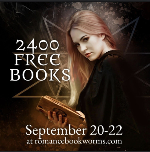 Red haired white witch holding a book. 2400 free books, Sept 20-22 at romancebookworms.com