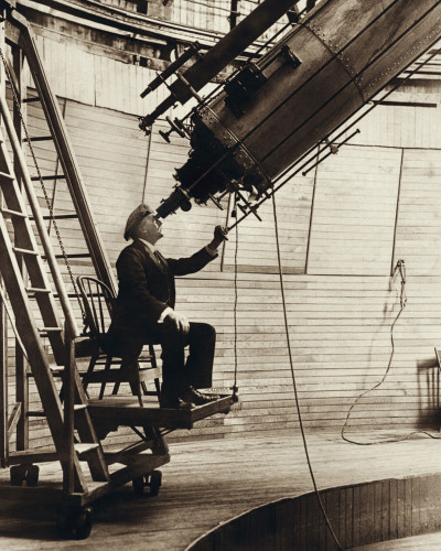 Percival Lowell observing Venus in the daytime from the observer's chair of the 24-inch (61 cm) Alvan Clark & Sons refracting telescope, installed in the summer of 1896 at the Lowell Observatory, which he established in Flagstaff, Arizona (USA). Although known for observing Mars, this image has a long running attribution of "Percival Lowell observing the planet Venus in the daytime", something he did from 1896 onward, observing the planet high in the daytime sky with the telescope's lens stopped down to 3 inches in diameter. This image of an older Lowell was taken in 1914.