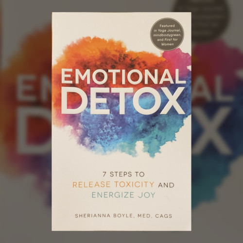 A photo of a trade paperback book, overlayed on a blurred, darkened, and square-cropped background of itself. All cover wording is in a clean sans serif font.

The book is white with a white-lettered title, "Emotional Detox," inside an uneven water-color painted blotch. The blotch is composed of red tones at the top and blue tones at the bottom.

Below the blotch is the sub-titling, "7 STEPS TO RELEASE TOXICITY AND ENERGIZE JOY," and author credit across the bottom, "SHERIANNA BOYLE, MED, CAGS."

In the upper right corner a gray-filled circle with a thin white border inside its edge contains the blurb, "Featured in Yoga Journal, mindbodygreen, and First for Women."