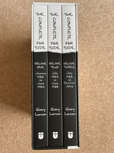 Picture of the three volume set of The Complete Far Side with cow pattern