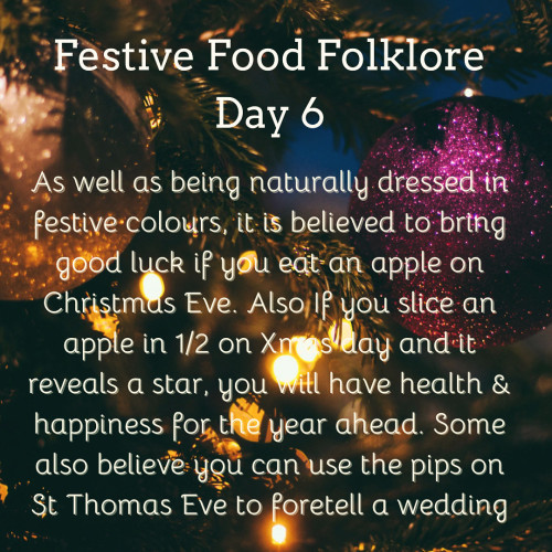Festive Food Folklore - Day 6

As well as being naturally dressed in festive colours, it is believed to bring good luck if you eat an apple on Christmas Eve. Also If you slice an apple in 1/2 on Xmas day and it reveals a star, you will have health & happiness for the year ahead. Some also believe you can use the pips on St Thomas Eve to foretell a wedding. Cream text on a background low light with gleaming baubles hanging in a tree.