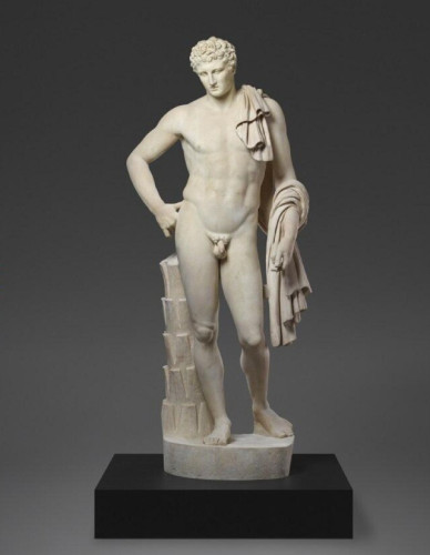As the god of travelers, Hermes is shown with a traveler’s cloak draped over his left shoulder and wrapped around his arm. Extensive research conducted by conservators from the J. Paul Getty Museum revealed that the sculpture’s right leg and the palm tree which supports him originally came from a different ancient statue. In past centuries it was common to complete fragmented ancient works by using pieces from other sculptures in this manner.