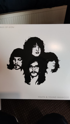 Kings of Leon - Youth and Young Manhood vinyl cover with 4 members of the Band on the front drawn 