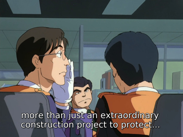 A picture from Mobile Police Patlabor (1988). One character tells another one:

... more than just an extraordinary construction project to protect...