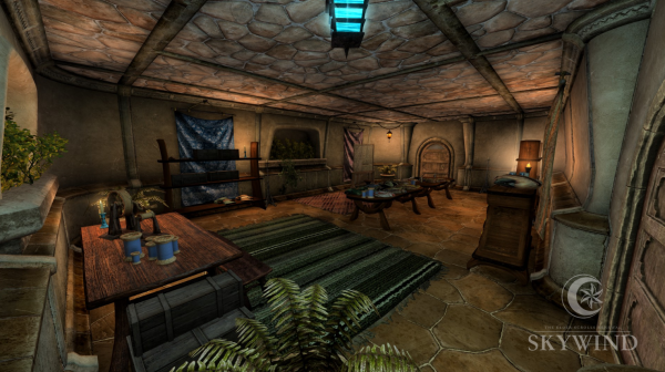 A screenshot of the Tailors and Dyers Hall from Skywind. Varied tapestries hang on the walls, plants grow in alcoves, and several tables and shelves are covered in sewing implements and clothing.