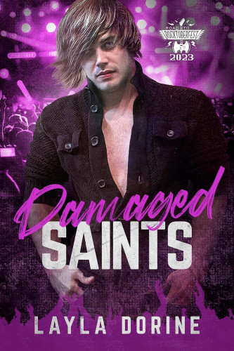 Cover - Damaged Saints by Layla Dorine - Young white man with a bieber cut and a black shirt open to show his chest, in front of a purple concert crowd