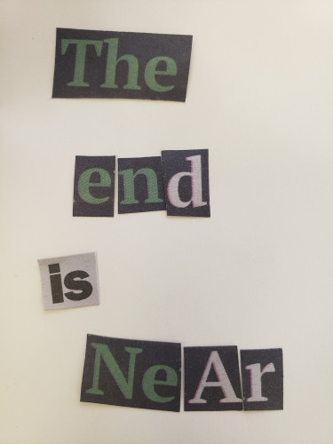 Cut out newspaper letters that speak out the words "The end is near"