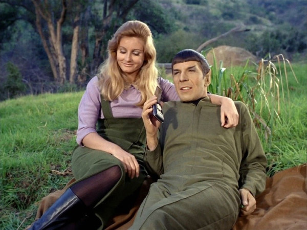 Spock and Leila laying in a field