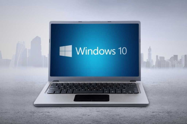 A generic laptop displaying the Windows 10 logo on the screen.