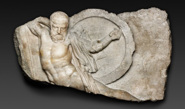 Description from the museum: “The dying warrior’s noble countenance, the fillet or ribbon tied around his forehead, and his powerful, athletic body epitomize what Pheidias and his pupils sought to project as the ideal of mature male dignity in the decade when Athens was at the height of its power in the eastern Mediterranean world. Some five centuries later, collectors such as the Roman emperor Hadrian sought this Pheidian style, translated from a circular golden shield to a rectangular marble relief, to decorate their palaces and villas. Athenian sculptors of the Roman era made a good living creating and exporting such memories of past glories. This relief and a number of others were found near Athens in the harbor of Piraeus, where they had been lost in a disaster, likely while awaiting shipment.”