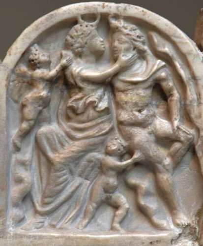 Marble relief depicting the moon goddess Selene-Luna and the shepherd Endymion. They are sitting side by side and she is touching his cheek about to initiate a kiss. Behind her and to both their feet, winged Erotes (Loves) symbolise their mutual love and lust for one another.