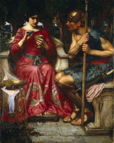Medea and Jason sit together while Medea pours a small vial into a goblet while Jason watches on intently.