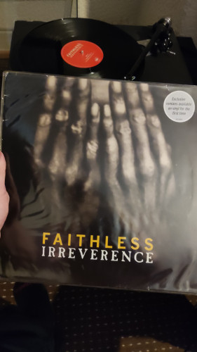 Faithless Irreverence vinyl cover of hands over a face 