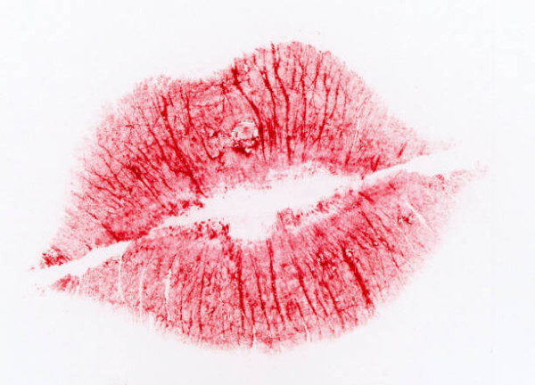 A lipstick kiss on a white background.