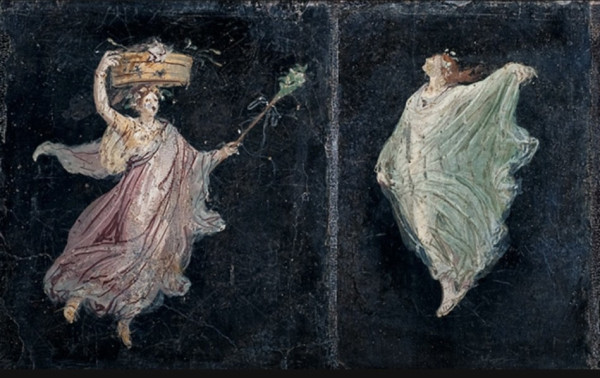 Two female figures appear to dance while seemingly floating against a dark blue-black background. The figure on the left holds a basket over her head and a thyrsus in her left hand suggesting a connection with Dionysus. The figure to the right wears a crown of flowers while holding the fabric of her dress as she dances.