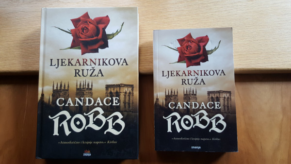 Book covers--below, York Minster and the author name, above, a red rose over the title. 