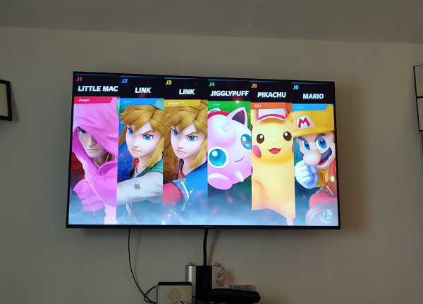 Me and some friends playing local multiplayer of Smash Ultimate. With 6 players in the arena.

Little Mac, Link, Link again, Jigglypuff, Pikachu and Mario!