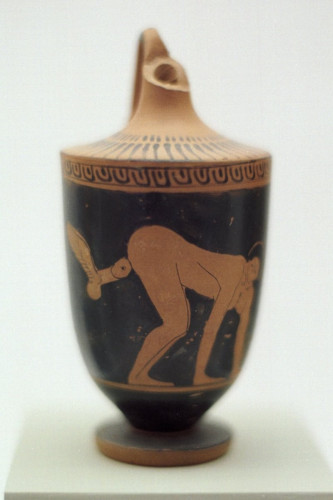 Red-figure vase painting of a woman on all fours with a winged phallus that looks just about ready to penetrate her.