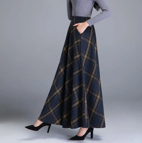 Popular skirt style in Korea and parts of China. A long plaid wool skirt, with pockets and only tailored in the waist. 