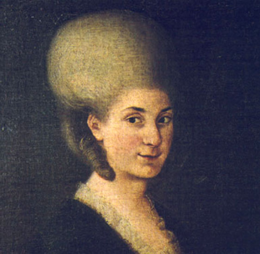 A painted portrait of Maria Anna Mozart, her face turned slightly away from the viewer but looking back towards them. Her light hair is pulled up in a giant beehive puff of hair with curls coming down. She smiles slightly.  She wears a plain dark gown with lace on the collar. 