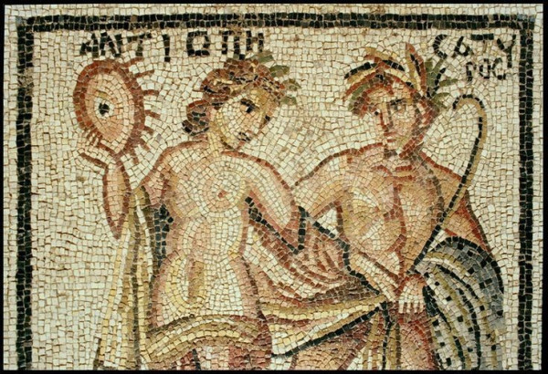 Mosaic of Antiope and Zeus in the shape of a satyr. The name Antiope is spelled above her head, Zeus is only designated as "satyr".