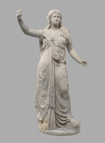 Description from the museum: “The statuette represents a Hellenistic queen. It is probably Cleopatra II, who lived in the 2nd century BC and belonged to the Ptolemaic dynasty, which succeeded the Macedonian king Alexander the Great in ruling over Egypt. Over an undergarment (chiton) she wears the characteristic robe of Isis, a long coat draped with flowing folds and a special knot over the chest, the so-called Isis knot. She is therefore equated with one of the highest Egyptian deities. This is a common tradition among the Hellenistic queens, which helped to legitimize and secure their rule. The Egyptian pharaohs had already referred to their divine descent in this sense and had them depicted together with gods.”