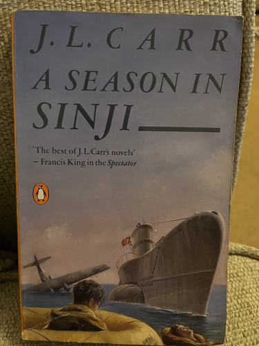 Front cover of the novel  A Season in Sinji