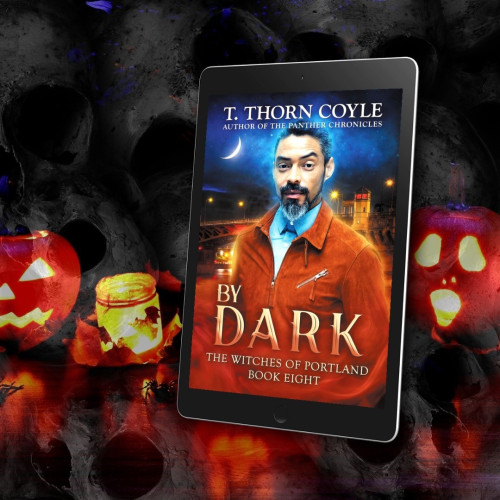 Glowing Jack o lanterns and skulls. E-reader tablet with Latine man. Crescent moon. By Dark.