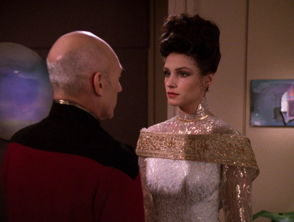 Kamala in a wedding gown and Picard in dress uniform 