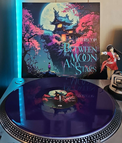 A purple vinyl record sits on a turntable. Behind the turntable, a vinyl album outer sleeve is displayed. The front cover shows a house sitting on a cliff over a swamp looking area. Someone is standing across water looking up at it, and a moon is behind the house. 

To the right of the album cover is an anime figure of Yuki Morikawa singing in to a microphone and holding her arm out. 