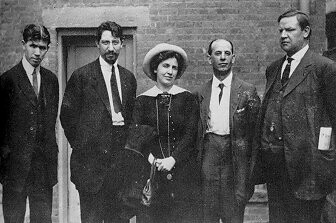 1913 photo of Paterson silk strike leaders Patrick Quinlan, Tresca, Elizabeth Gurley Flynn, Adolph Lessig, and Bill Haywood. By Unknown author - http://www.oocities.com/CapitolHill/5202/rebelgirl.html, Public Domain, https://commons.wikimedia.org/w/index.php?curid=48211200