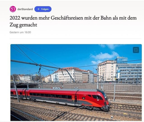 Zu sehen ist der Screenshot eines Artikels von "Der Standard" aus Österreich. Das Bild zeigt einen roten Railjet-Zug der ÖBB auf Schienen. Die Überschrift lautet "2022 wurden merh Geschäftsreisen mit der Bahn als mit dem Zug gemacht".