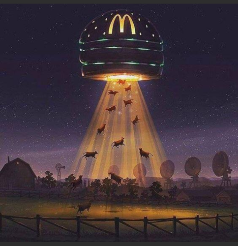 A UFO with a MacDonalds sign beaming up caddle.
